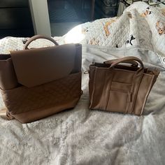 Nwot Aria Diaper Bag Bundle. Comes With Both Diaper Backpack And Purse! Brand New And In Perfect Condition! Purse Retails For $100 Brand New And Backpack Retails For $150 Brand New. Both Are Very Spacious And Stylish! Also Comes With A Small Card Holder Wallet And Multiple Strap Attachments For The Purse! *Open To Reasonable Offers *No Holds Or Trades *Smoke Free Home Brown Backpack With Removable Pouch For Shopping, Brown Backpack With Detachable Handle, Brown Rectangular Diaper Bag With Detachable Strap, Brown Rectangular On-the-go Diaper Bag, Shopping Backpack With Detachable Strap In Brown, Brown Shopping Backpack With Detachable Strap, Brown Tote Diaper Bag With Detachable Strap, Brown Backpack With Detachable Strap For Shopping, Brown Diaper Bag With Removable Pouch And Double Handle