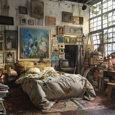 a bed sitting in a bedroom next to a window filled with pictures and paintings on the wall