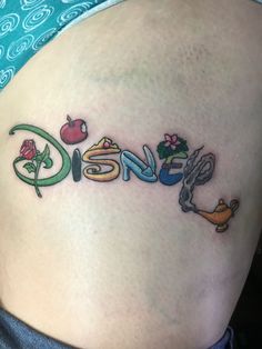 a woman's thigh with the word disney written in it and some cartoon characters