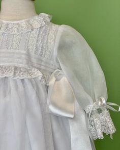 White Christening Gowns - Baptismal Dresses - Miami – YoYo Boutique Elegant Baptism Dress With Lace Trim And Organza, White Organza Baptism Dress With Ruffles, Elegant Organza Baptism Dress For Ceremony, Ceremony Baptism Dress With Lace Trim And Fitted Bodice, Organza Baptism Dress With Lace Bodice For First Communion, White Organza Baptism Dress With Lace Trim, Classic Lace Baptism Dress For Ceremony, Organza Baptism Gown With Ruffles, Classic Fitted Baptism Dress With Lace Bodice