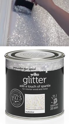 a person using a paint brush to apply glitter on the floor in a white room