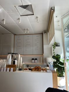 a coffee shop with menus on the wall