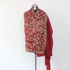 "Kashmiri Silk Embroidered Fine Merino Wool Shawl.This Multi Color Shawl Is Made Of Fine Merino Wool Its Embroidered With Multi Colours.The Embroidery Done On This Is A Traditional Kashmiri Embroidery Known As 'Sozni Work'.Kashmiri Silk Thread Embroidery.Now Own A Rare Genuine Kashmiri Hand Embroidered Shawl Which Takes Many Months To Create, Unique In Design And Colour And, Have Never Been Replicated. Condition: Brand New Size: 40\" X 80\" (100 Cm X 200 Cm) Approx Colour: Maroon Style: Shawl Wr Festive Red Pashmina Shawl With Resham Embroidery, Festive Red Shawl With Chikankari Embroidery, Diwali Multicolor Embroidered Shawl, Festive Red Pashmina Shawl With Intricate Embroidery, Semi-stitched Shawl For Celebrations, Embroidered Red Pashmina Shawl For Festivals, Festive Multicolor Embroidered Pashmina Shawl With Zari Work, Festive Red Embroidered Pashmina Shawl, Embroidered Border Shawl For Traditional Ceremonies