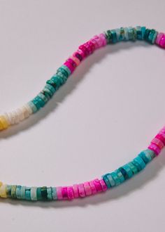 Sunset Adjustable Single Strand Rondelle Beads, Multicolor Rondelle Single Strand Jewelry, Multicolor Single Strand Rondelle Jewelry, Multicolor Hand-strung Rondelle Beaded Necklaces, Adjustable Rondelle Necklaces With Colorful Beads, Hand-strung Heishi Beaded Necklaces, Multicolor Single Strand Rondelle Beaded Necklaces, Heishi Beads Jewelry With Faceted Round Beads, Multicolor Rondelle Beaded Necklaces Single Strand