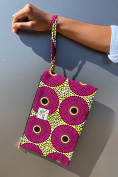 Colorful Ghanian wax print clutch wristlet to leave you hands-free while out-and-about. Holds all the essentials and more. Order it to match your backpack and duffel bag or as a stand-alone accessory. This is your new purse! Size 11” w x 7” h with 8” wrist strap Trendy Wristlet With Mobile Phone Bag For Travel, Trendy Mobile Phone Bag Wristlet For Travel, Trendy Travel Wristlet For Mobile Phone, Trendy Travel Wristlet With Mobile Phone Bag, Travel Wristlet Clutch With Mobile Phone Bag, Travel Clutch Wristlet With Mobile Phone Bag, Multicolor Wristlet With Mobile Phone Bag For Daily Use, Multicolor Rectangular Wristlet With Mobile Phone Bag, Multicolor Rectangular Wristlet For Mobile Phone