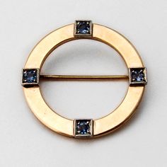 "Vintage 14 K (.585) yellow gold round form brooch, accented with 4 pale blue Sapphire stones, set in square bezels. This wonderful brooch is 1\" in diameter and weighs 2.8 grams. EA395" Sapphire Stones, Sapphire Stone, Gold Price, Tennis Bracelet, Jump Rings, 10k Gold, Pale Blue, Beautiful Bracelet, Blue Sapphire