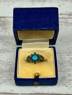 Vintage BELL TRADING POST Sterling Silver & Turquoise Pinky Ring Southwestern Boho Style 925. Here we have a fabulous little turquoise and silver ring by Bell Trading Post. The ring is crafted in sterling and centers around the solitaire turquoise cabochon in a sawtooth bezel setting and framed with a North Star motif. The band splits at the shoulders and is engraved with scalloped southwestern style motifs and completes with a simple shank underneath. The ring is hallmarked with the Bell Trading Post logo as well as STERLING at the shank's base. The ring is in good vintage condition with no issues to note and a darkened patina which can be polished if desired. The ring can be resized slightly, please inquire within prior to purchase if you need a quote to resize.  Measurements in inches: Western Style Gemstone Ring Gift, Western Style Gemstone Ring As Gift, Western Style Gemstone Rings For Gifts, Antique Turquoise Sterling Silver Ring, Heirloom Style Turquoise Sterling Silver Ring, Western Style Turquoise Ring Stamped 925, Western Style Stamped 925 Rings As Gift, Western Style 925 Silver Rings As Gifts, Bohemian Hallmarked Turquoise Ring