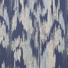 an abstract blue and white pattern on fabric