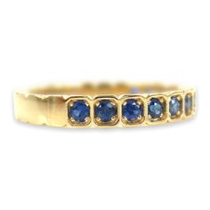 MADE TO ORDER (Only Ring size 6.25 Yellow gold available for immediate shipping). This magnificent Half-set Square-cut bezel box featuring prong-set round blue Sapphires crafted in 18k yellow gold. A stunning band on its own or stacked with another ring or bands. Based on Ring Size: 6.25 *Design: Half-set Band *Material: 18K Yellow Gold *Stones: Natural Blue Sapphires *Count: 13 PCS *Weight: 0.43cts T.W *Band Width: 2.8mm (with +/- 0.1mm variation) Stone weight varies depending on your requested Luxury Yellow Gold Sapphire Ring Channel Set, Classic Sapphire Stackable Jewelry, Classic Stackable Sapphire Jewelry, Rectangular Sapphire Ring In Yellow Gold, Rectangular Sapphire Ring In Gold For Formal Occasions, Gold Sapphire Ring With Rectangular Shape For Formal Events, Gold Rectangular Sapphire Ring For Formal Occasions, Luxury Yellow Gold Sapphire Ring Princess Cut, Luxury Princess Cut Sapphire Ring In Yellow Gold