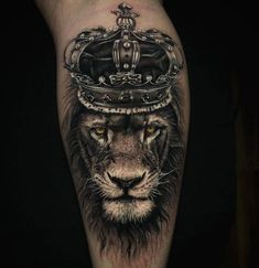 a lion with a crown on it's head is shown in black and grey