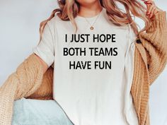 Introducing our 'I Just Hope Both Teams Have Fun Shirt' - the perfect blend of humor and sportsmanship for your wardrobe. Whether you're a dedicated sports fan or simply enjoy the spirit of the game, this shirt is a great choice. Crafted with premium materials for comfort and durability, it's not just a shirt; it's a statement. Wear it to the big game, a casual get-together, or wherever you want to spread positivity in the world of sports. M A T E R I A L S → All our simple color ones like White Funny Sports Shirts, Engineer Shirt, Coding Shirts, Minimalist Shirts, Funny Sports, Lucky Shirt, Dog Funny, Inspirational Tees, Fun Shirt