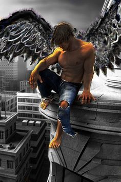 a man sitting on top of a building with an angel wings above his head and buildings in the background