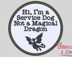 an oval sign that says, i'm a service dog not a magical dragon