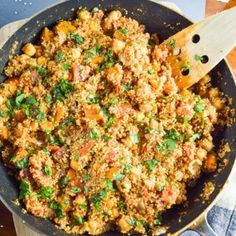 a skillet filled with food on top of a table