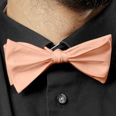 Salmon pink is still classy, while being a little offbeat and unique. Perfect for any occasion, formal or casual, this beautiful pink bow tie is one you get to tie yourself. That means you can adjust it to fit you perfectly, and take pride in having tied it all by yourself. Pink Bow Tie For Summer Formal Events, Pink Bow Tie For Black Tie Events, Classic Pink Bow For Formal Occasions, Elegant Pink Bow For Black Tie Events, Pink Butterfly Knot Bow For Summer, Pink Fitted Bow For Formal Occasions, Adjustable Pink Bow Tie For Black Tie Events, Pink Formal Bow With Bow Tie Back, Classic Adjustable Pink Bow Tie