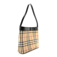 This is an authentic BURBERRY Vintage Check Shoulder Bag in Black. This stylish tote is crafted of beige Burberry check coated canvas. The shoulder bag features black trim, a black leather shoulder strap, and silver hardware. The top opens to a black fabric interior with a zipper pocket. Check Coat, Burberry Vintage, Reversible Tote, Burberry London, Shoulder Bag Black, Blue Ink, Print Tote, Black Trim, Silver Hardware