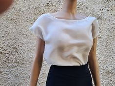 This is a sewing pattern PDF and is suitable to be printed at home. It is an easy sewing pattern for BEGINNERS level You can visit my shop to see and buy the same fabric that this silk blouse is made of. https://www.etsy.com/listing/1775867387/white-ivory-100-silk-fabric-sell-by Make your own blouse that you like in your choice fabric and will be unique - ONE OF A KIND. Timeless modern style which is elegant and suitable for many occasions. The simple boxy top fits perfectly over an evening skir Bateau Neckline Top, Silk Padded Short Sleeve Blouse, Silk Padded Blouse With Short Sleeves, Silk Summer Top, Women's Sewing Pattern, Boat Neck Blouse, Evening Skirts, Length Measurement, Loose Shirt