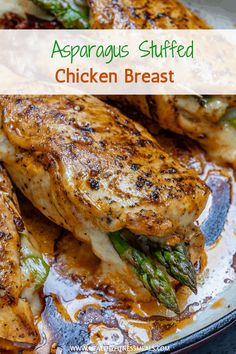 grilled chicken breast with asparagus and sauce in a pan