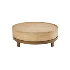 a round wooden table with two legs on one side and an oval wood base on the other