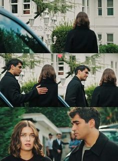 two people are talking to each other in front of a building and one person is holding his arm around the woman's shoulder