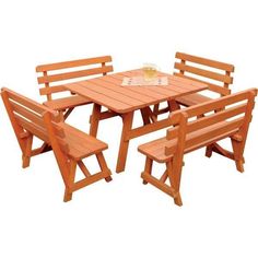 a wooden table with four benches around it