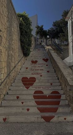 there are many steps with hearts painted on them