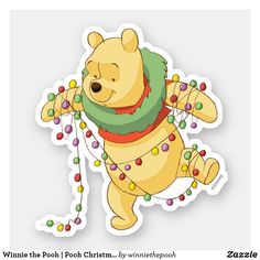 a winnie the pooh sticker with christmas lights around it's neck and legs