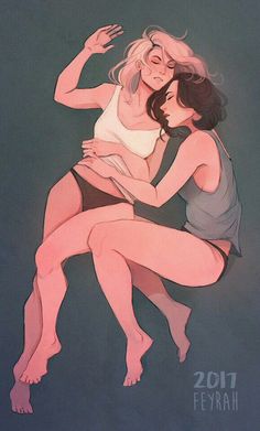 two women are hugging each other in the air