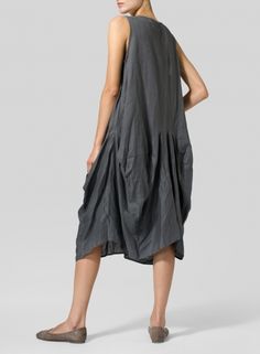 Linen Sleeveless Draped Dress Sleeveless Pre-draped Dress With Ruched Back, Flowy Draped Ruched Dress, Chic Draped Maxi Dress With Pleated Back, Draped Dresses With Flattering Silhouette, Flowy Draped Midi Dress, Pleated Waist Pre-draped Dresses, Pleated Draped Asymmetrical Dress For Summer, Draped Dresses With Folds For Spring, Summer Pleated Draped Asymmetrical Dress