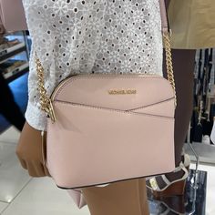 Michael Kors Jet Set Travel Medium Dome Crossbody Bag Powder Blush New With The Tag Authentic This Crossbody Bag Boasts Signature Appeal In Canvas That’s Accented With Top-Stitch Detailing. Rendered In A Structured Dome Shape, It Features An Adjustable Chain-Trimmed Strap And A Convenient Back Slip Pocket. Crossbody Bag Saffiano Leather 100% Leather From Tanneries Meeting The Highest Standards Of Environmental Performance From Tanneries Meeting The Highest Standards Of Environmental Performance Gold-Tone Hardware 8.5”W X 6.75”H X 3.5”D Exterior Details: Back Slip Pocket Interior Details: Back Zip Pocket, Front Slip Pocket Lining: 100% Polyest Michael Kors Bedford, Michael Kors Mercer, Michael Kors Crossbody Bag, Exterior Details, Black Crossbody Purse, Michael Kors Crossbody, Powder Blush, Cross Bag, Black Leather Handbags