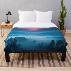 Transform your bedroom with a throw blanket featuring stunning mountain views and a serene mountain aesthetic. Inspired by mountain photography and mountain art, it showcases an illustration of mountains under a blue sky. Perfect for mountain hiking enthusiasts and those who love night sky art with night sky stars and watercolor vibes. This piece adds beautiful mountain scenery to your space.