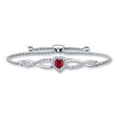 A heart-shaped, lab-created ruby is complemented by ribbons of round lab-created white sapphires and sterling silver in this lovely bracelet for her. A sliding bolo clasp allows the bracelet to be adjusted up to 9.5 inches in length. Ruby Jewelry Necklaces, Bracelet For Her, Ruby Heart, Diamond Choker Necklace, Bolo Bracelet, Rope Jewelry, Mens Bracelet Silver, Kay Jewelers, White Bracelets