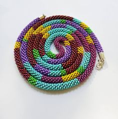 The long lariat is handmade work. This multicolour necklace in boho style for women. The necklace made of Czech beads, cotton tread. The long necklace is flexible jewelry. The size of necklace: *55inches(140cm) Multicolour Necklace, Yellow Crochet, Long Necklace Boho, Necklace Purple, Czech Beads, Handmade Boho, Lariat Necklace, Necklace Gift, Necklace For Women