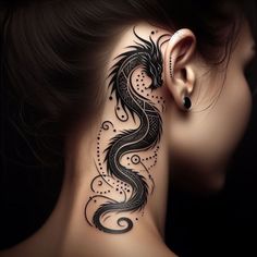 a woman's neck with a black dragon tattoo on the back of her neck