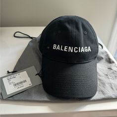 Black Balenciaga Hat Brand New Never Worn. Have Dust Bag And Receipt. Black And White Jumpsuit With Black Speed Balenciaga, Balenciaga Kids Backpack, Balenciaga Face Mask, Balenciaga Hat, Black Balenciaga, Balenciaga Black, Balenciaga, Dust Bag, Women Accessories