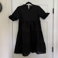 Uk 10 Eu 38 Us 6 Aus 10 Runs Small Dress Length Is About 33”-34” Never Worn, Still Has Tags 65% Polyester, 35% Cotton Fitted Knee-length Tiered Dress For Daywear, Chic Knee-length Smocked Mini Dress, Spring Smock Dress For Work, Knee-length Tiered Dress For Day Out, Casual Black Summer Tiered Dress, Casual Black Tiered Summer Dress, Black Mid-length Daywear Dress, Black Mid-length Dress For Daywear, Fitted Knee-length Tiered Dress For Day Out