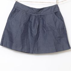 **J. Crew** A Shape Mini Skirt Sides Packets *Nwot. Dark Chambray Material. 100% Cotton. Size 4, Waist 32" 16" Long, 44" Wide. Skirt Wears Below The Waist! Spring Skirted Shorts With Pockets, Casual Skirted Shorts With Pockets, Casual Cotton Flared Skort, Casual Skort With Elastic Waistband For Work, Casual Blue Skort For Work, Short Cotton Skirt For Work, Casual Mini Skirt With Elastic Waistband For Work, Cotton Short Skirt For Work, Casual Skirted Bottoms For Workwear