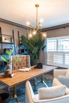 a living room filled with furniture and a wooden table