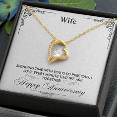 Give a loving gift that will make her heart melt! This dazzling Forever Love Necklace features a polished heart pendant surrounding a flawless 6.5mm cubic zirconia, embellished with smaller crystals adding extra sparkle and shine. The pendant is crafted in your choice of 14K white gold finish or 18K yellow gold finish, and dangles from an adjustable cable chain secured with a lobster clasp.Product Details:• 14K white gold finish or 18K yellow gold finish• Adjustable cable chain 18" - 22"• 6.5mm To My Future Wife, Wife Necklace, Knot Stud Earrings, Knot Studs, Beste Mama, Loving Gifts, Daughter Necklace, I Love You Forever, Heart Melting