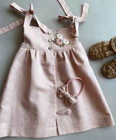 This beautiful linen toddler dress is perfect for summer as it is soft, light and plenty of room for movement. This is a perfect choice for 1st birthday dress, birthday gift, formal event, or just every day dress. The color may vary slightly due to differences in viewing devices. If you need other color or size, please messages for me! If you need the dress urgently, please messages for me! 🌸MATERIAL: Material: Linen. Size : Newborn => 8 years. Please scroll to see available sizes and colors. ? Cute Linen Beach Dress, Cute Linen Summer Dress, Summer Birthday Cotton Dress, Spring Birthday Cotton Dress, Pink Sundress For Summer, First Birthday Girl Dress, Dress With Roses, Roses Embroidery, First Birthday Girl