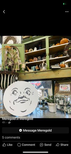 an image of a face on a plate in front of a shelf with other items