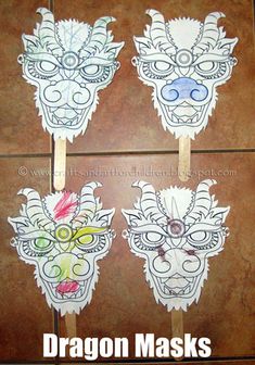 four masks with different designs on them