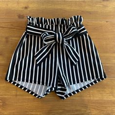 Windsor Cute High Waist Shorts Size- Small Color- Black And White Stripes Material- 95% Polyester, 5% Spandex Condition- New With Tags, Excellent, No Flaws Stylish Shorts Can Be Paired With A Black Top And Has A Waist Tie For Flare! Its Perfect For Outings With Friends, Dinners, Or Parties! Smoke-Free Home Any Questions, Leave A Comment! Chic High Waist Striped Shorts, Fuzzy Shorts, Distressed High Waisted Shorts, Stylish Shorts, Black Lace Bodysuit, Black High Waisted Shorts, Satin Trousers, Shorts Cute, Tie Shorts