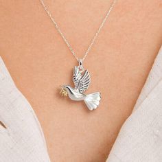 This stunning personalised two-tone sterling silver and yellow gold dove of peace necklace is perfect for all ages. Not to be found anywhere on the high street, our beautiful fox charm necklace is crafted from the finest sterling silver and a touch of 18ct yellow gold. Featuring a warming gold on the olive branch that is being gently carried in his beak, this gorgeous dove of peace pendant is suitable for almost any age. Make your necklace even more special by choosing your chain length and addi Fox Charm, The Olive Branch, Dove Of Peace, Dove Necklace, Peace Necklace, Mens Jewelry Necklace, Olive Branch, Gifts For Adults, Handmade Necklaces