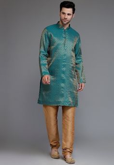 Art Silk Jacquard Kurta in Teal Blue Color. This Ready-made Chinese Collar Neck and Full Sleeve attire is Enhanced with Buttons and Jacquard Work. Available with an Art Silk Churidar in Beige Color.   Do note: Footwear shown in the image is for presentation purposes only. Half to one inch may vary in measurement. (Slight variation in actual color vs. image is possible) We Sell all kinds of Menswear. Mens Kurta | Mens Kurta & Churidar | Traditional Menswear | Ethnic Wear | Partywear | Menswear | Blue Kurta With Zari Weaving In Traditional Drape, Blue Kurta With Zari Weaving For Festivals, Blue Kurta With Zari Weaving For Diwali, Festive Blue Kurta With Zari Weaving, Blue Art Silk Kurta With Long Sleeves, Blue Brocade Traditional Wear With Self Design, Blue Kurta With Self Design For Transitional Season, Blue Self Design Kurta For Festive Occasions, Traditional Fitted Turquoise Kurta