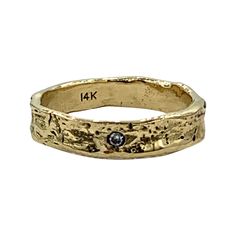 This rustic and unique simple ring was cast from real persimmon tree bark. It is set with a single 1.7mm diamond cut H1 G1 diamond. This piece is cast to size in solid 100% pure recycled 14k gold. Specs : the ring is 1/8 of an inch (4.4mm) wide and 1/16 of an inch thick (2mm) thick. The interior is smooth finished and very comfortable. It looks so much like tree bark because it was cast from the real thing. I see this piece as a lifetime keeper. It would make a beautiful understated and natural Rustic Hammered Jewelry For Anniversary, Rustic Hand Forged Rings For Anniversary, Oak Tree Engagement Ring, Carved Bone Ring, Birch Bark Jewelry, Bark Wedding Ring, Knife Shapes, Bark Ring, Shape Meaning