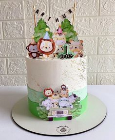 there is a cake with animals on it