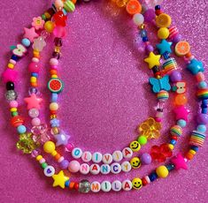 Bright, colourful and fun mixed bead necklace. Can be personalised with any name or word please let me know on checkout.    Bracelets can either be elasticated or made with a silver or gold plated clasp. All materials are high quality. Please choose your size at check out. Thank you 💕  Designs will vary and will all be individual but will all include a smiley! 😍 Perfect stocking fillers, birthday gifts or just a day brightener! A handy necklace length image can be found in pictures. Colorful Beaded Necklaces With Letter Beads For Jewelry Making, Trendy Customized Multicolor Necklaces, Trendy Customized Multicolor Necklace, Fun Multicolor Customizable Jewelry, Whimsical Beaded Necklaces With Letter Beads For Gift, Pink Letter Beads Fun Necklaces, Fun Pink Beaded Necklaces With Letter Beads, Playful Personalized Multicolor Beaded Necklaces, Fun Beaded Birthday Necklace