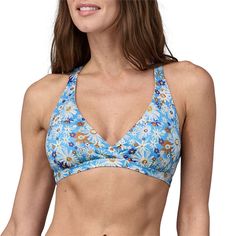 evo.com | Patagonia Swimsuit Tops > This athletic and supportive scoop neck top keeps all the weight off of your neck for comfortable, all-day wear. The Patagonia Bottom Turn Bikini Top has a pull-on racerback design and an open back for comfort, security, and ease of movement whether you're sending it through some white water rapids, suiting up for a surf sesh, or just reclining for a day in the sun. Crafted mainly from recycled materials, this sustainable piece is equipped to be a sunshine sta Blue Nylon Swimwear With Built-in Padding, Supportive Blue Elastane Swimwear, Racerback Swimwear With Built-in Padding For Summer, Summer Racerback Swimwear With Built-in Padding, Blue Racerback Swimwear For Vacation, Blue T-back Swimwear With Moderate Back Coverage, Medium Support Swimwear For Summer Swimming, Casual Nylon Swimwear With Bra-friendly Design, Blue Racerback Swimwear With Adjustable Straps