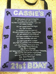 a purple sign with black writing on it that says cassise's and is attached to a bag